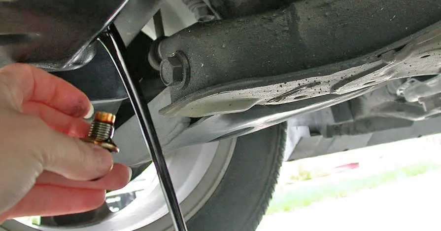 How to remove an over tightened oil plug
